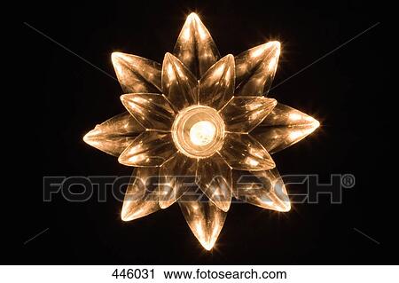 Candle in flower shaped holder View Large Photo Image Stock Image - Candle in flower shaped holder. Fotosearch