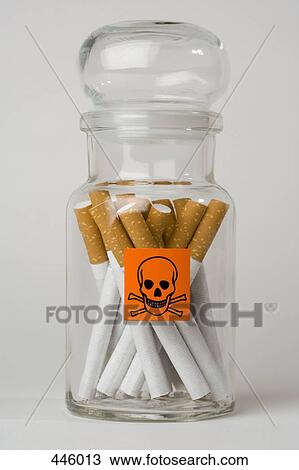 Cigarettes in a glass jar View Large Photo Image Stock Image - Cigarettes in a glass jar. Fotosearch