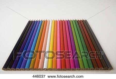 Colored pencils arranged in a row View Large Photo Image Stock Photo - Colored pencils arranged in a row. Fotosearch