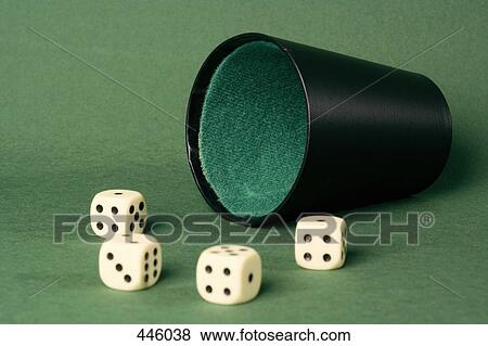 Four dice and a dice cup View Large Photo Image Stock Photo - Four dice and a dice cup. Fotosearch