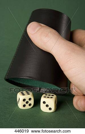 Two dice and a dice cup View Large Photo Image Stock Photo - Two dice and a dice cup. Fotosearch
