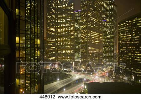 Downtown cityscape and highway at night, Los Angeles, California View Large Photo Image Stock Image - Downtown cityscape and highway at night, Los Angeles, California. Fotosearch