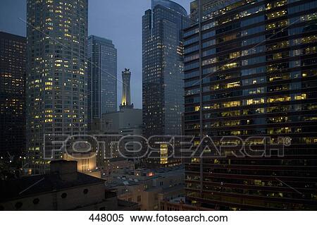 Illuminated skyscrapers in the downtown district at night, Los Angeles, California View Large Photo Image Stock Photography - Illuminated skyscrapers in the downtown district at night, Los Angeles, California. Fotosearch