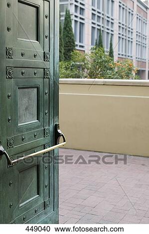 Stock Image - View through a doorway onto a terrace. Fotosearch