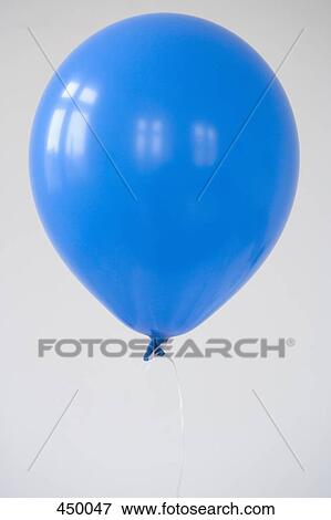 A blue balloon View Large Photo Image Stock Photo - A blue balloon. Fotosearch