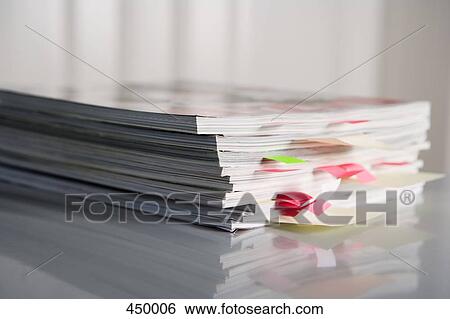 A stack of magazines View Large Photo Image Stock Photograph - A stack of magazines. Fotosearch