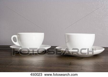 Two cups and saucers View Large Photo Image Stock Image - Two cups and saucers. Fotosearch
