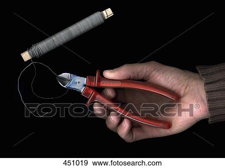 Man cutting wire with pliers View Large Photo Image Stock Photo - Man cutting wire with pliers. Fotosearch