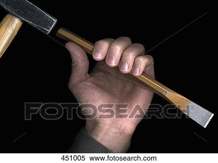 Man holding a hammer and a chisel View Large Photo Image Stock Photography - Man holding a hammer and a chisel. Fotosearch
