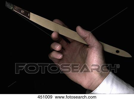 Man holding a paint brush View Large Photo Image Stock Photo - Man holding a paint brush. Fotosearch