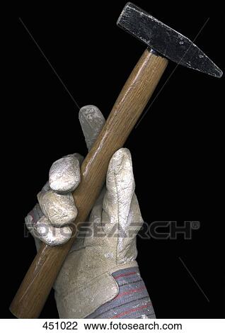 Person wearing a work glove and holding a hammer View Large Photo Image Stock Image - Person wearing a work glove and holding a hammer. Fotosearch
