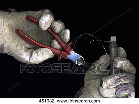 Person wearing work gloves and cutting wire with pliers View Large Photo Image Stock Image - Person wearing work gloves and cutting wire with pliers. Fotosearch