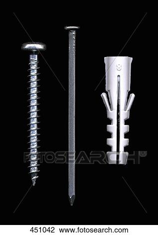 Stock Image - Screw, nail and plastic wall plug. Fotosearch