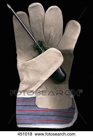 Work glove and a screwdriver View Large Photo Image Stock Photo - Work glove and a screwdriver. Fotosearch