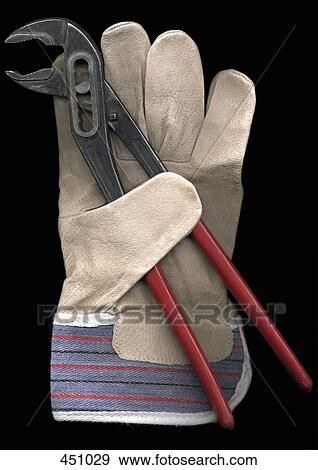Work glove and pliers View Large Photo Image Stock Photo - Work glove and pliers. Fotosearch