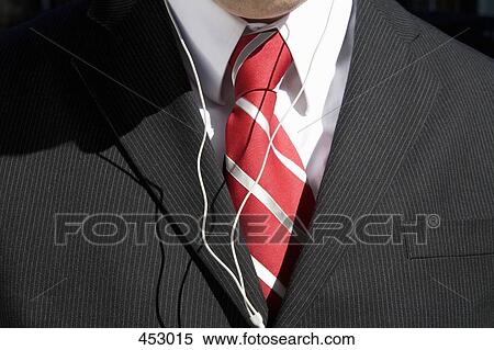 Businessman wearing headphones View Large Photo Image Stock Photography - Businessman wearing headphones. Fotosearch