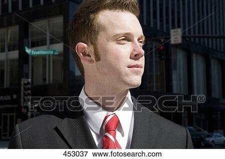 Stock Photo - Portrait of a young businessman. Fotosearch