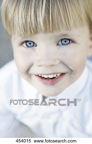 Portrait of a young boy View Large Photo Image Stock Photography - Portrait of a young boy. Fotosearch