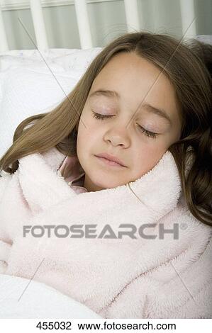 A girl sleeping in bed View Large Photo Image Stock Image - A girl sleeping in bed. Fotosearch