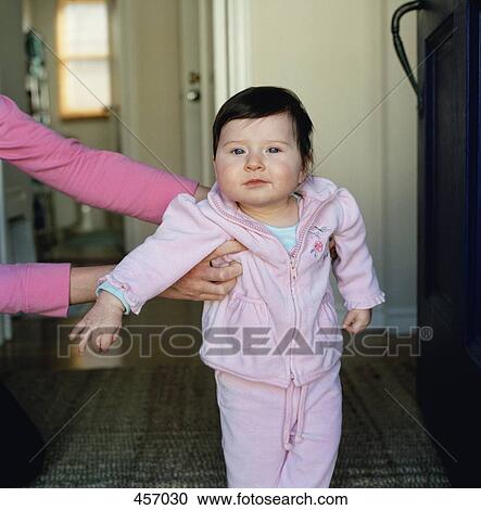 Mother teaching baby girl to walk View Large Photo Image Stock Image - Mother teaching baby girl to walk. Fotosearch