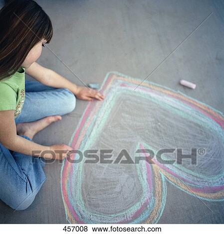 Young girl drawing a heart in chalk View Large Photo Image Stock Photo - Young girl drawing a heart in chalk. Fotosearch