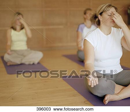 A yoga class View Large Photo Image Stock Image - A yoga class. Fotosearch