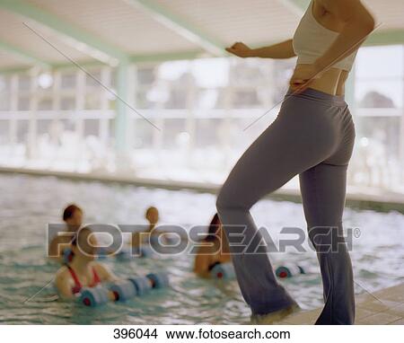Women doing a water aerobics class View Large Photo Image Picture - Women doing a water aerobics class. Fotosearch