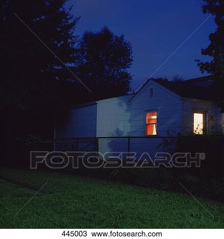 Stock Image - House at night. Fotosearch