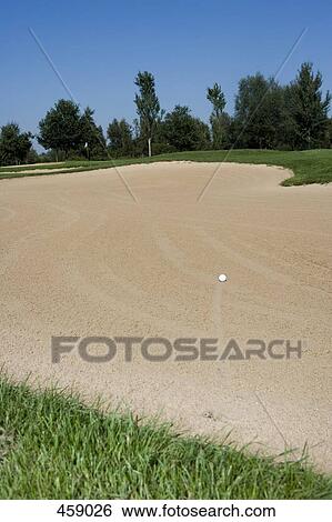 A golf ball in a sand bunker View Large Photo Image Stock Photograph - A golf ball in a sand bunker. Fotosearch