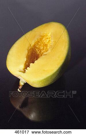 A mango half View Large Photo Image Stock Photo - A mango half. Fotosearch