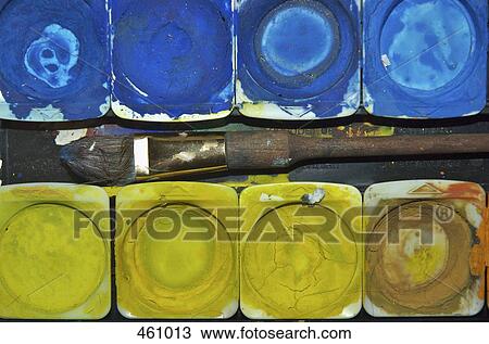 Detail of a paintbrush and watercolor paints in a palette View Large Photo Image Stock Image - Detail of a paintbrush and watercolor paints in a palette. Fotosearch