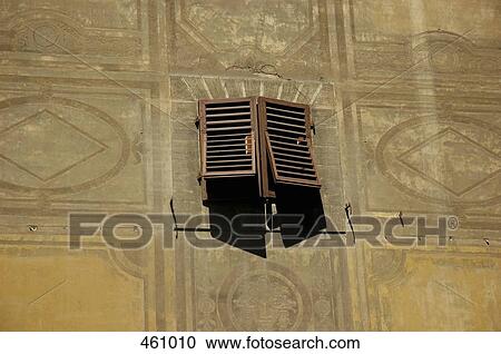 Stock Image - Shuttered window of a building, Italy. Fotosearch
