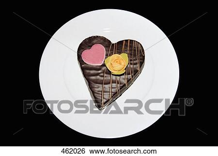 A heart shaped chocolate cake View Large Photo Image Stock Photograph - A heart shaped chocolate cake. Fotosearch