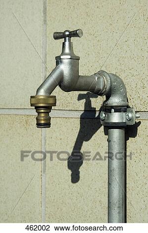 An outdoor tap View Large Photo Image Stock Image - An outdoor tap. Fotosearch