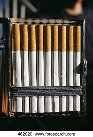Cigarettes in a metal case View Large Photo Image Stock Image - Cigarettes in a metal case. Fotosearch