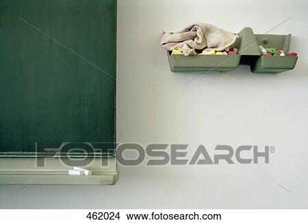 Detail of a chalkboard and a tray of chalk View Large Photo Image Picture - Detail of a chalkboard and a tray of chalk. Fotosearch