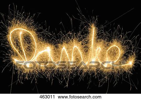 Stock Image - Danke' drawn with a sparkler. Fotosearch