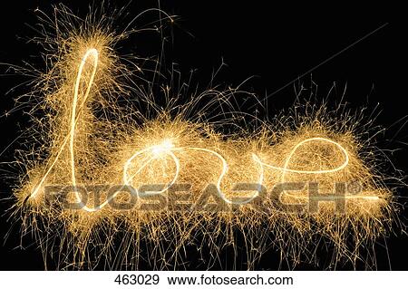 Stock Photo - Love' drawn with a sparkler. Fotosearch