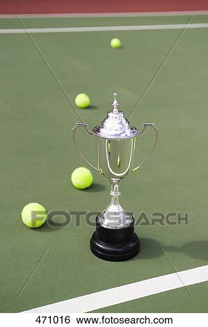 A silver trophy and tennis balls View Large Photo Image Stock Photograph - A silver trophy and tennis balls. Fotosearch