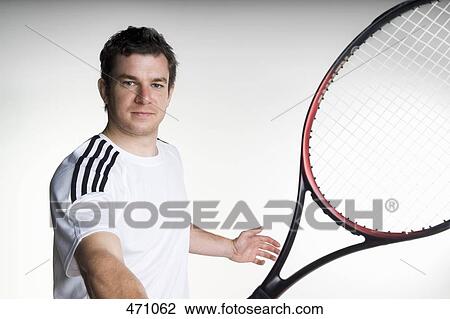 Stock Image - A tennis player. Fotosearch