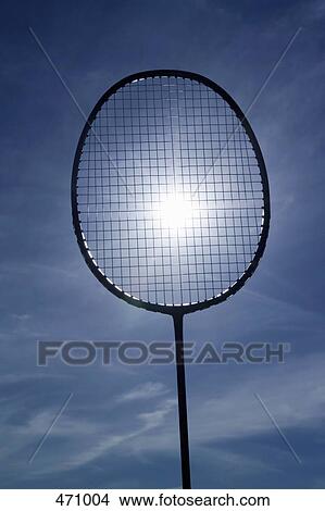 The sun shining through a tennis racquet View Large Photo Image Picture - The sun shining through a tennis racquet. Fotosearch