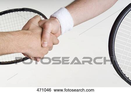 Stock Photograph - Two tennis players shaking hands. Fotosearch