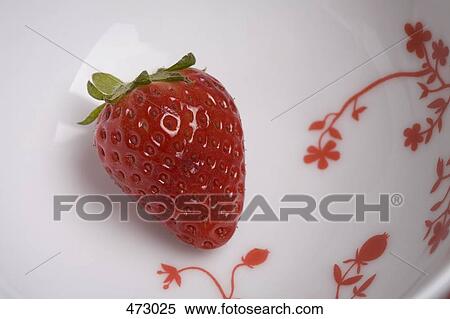 A strawberry in a bowl View Large Photo Image Stock Photography - A strawberry in a bowl. Fotosearch