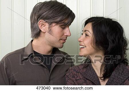 A young couple face to face View Large Photo Image Stock Image - A young couple face to face. Fotosearch