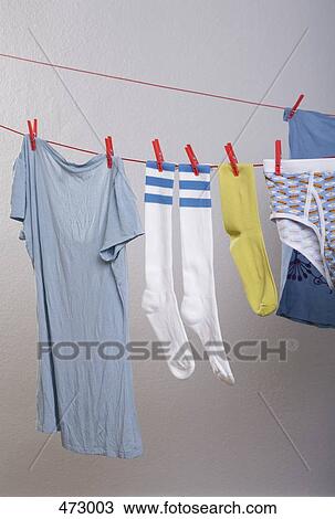 Stock Image - Laundry hanging on a clothes line. Fotosearch