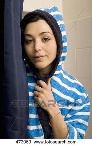 Portrait of a woman wearing a striped bathrobe View Large Photo Image Stock Image - Portrait of a woman wearing a striped bathrobe. Fotosearch