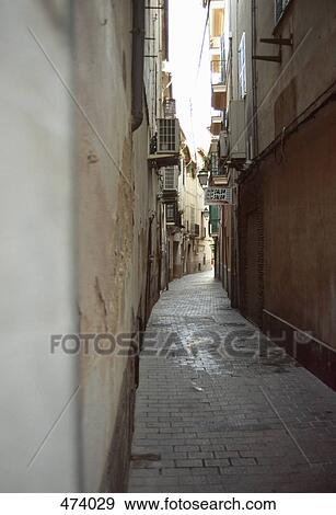 A narrow alley, Palma, Majorca, Spain View Large Photo Image Stock Photo - A narrow alley, Palma, Majorca, Spain. Fotosearch