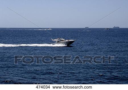 A speedboat on the sea View Large Photo Image Picture - A speedboat on the sea. Fotosearch