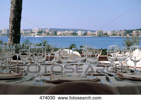A table set for a wedding reception View Large Photo Image Stock Image - A table set for a wedding reception. Fotosearch