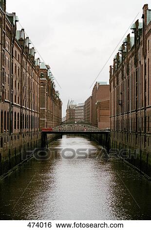 Canal between buildings, Speicherstadt, Hamburg, Germany View Large Photo Image Stock Photograph - Canal between buildings, Speicherstadt, Hamburg, Germany. Fotosearch